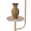 Close-up of round brass side table tray with tan marble-patterned vase, brass arc arm visible behind, white background