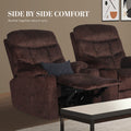 Two brown fabric tufted recliners side by side: one with footrest extended and navy cushion, one upright, in living room