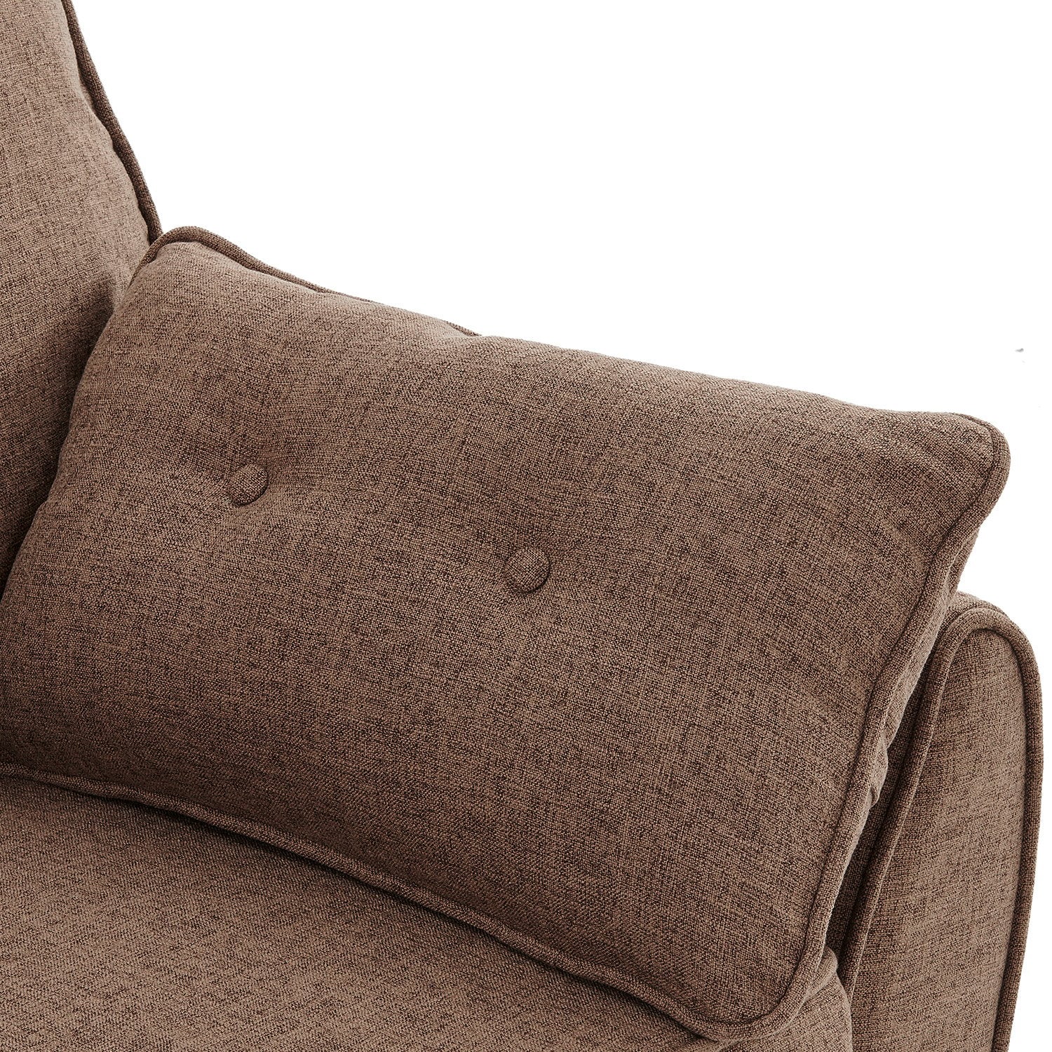 Close-up of brown linen button-tufted scatter pillow resting on rounded sofa arm