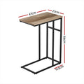 C-shaped side table with oak wood grain top on black metal frame, 47x27cm top, 64cm tall, shown with dimension labels.