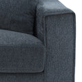 Close-up of charcoal chenille sofa left armrest and back cushion corner showing fabric texture