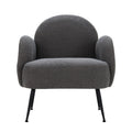 Charcoal grey boucle armchair with rounded arch back, curved armrests, and black metal legs, front view on white background