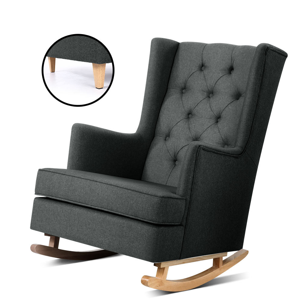 Charcoal fabric tufted wingback rocking chair on natural wooden rocking legs, angle view on white background