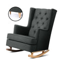 Charcoal fabric tufted wingback rocking chair on natural wooden rocking legs, angle view on white background