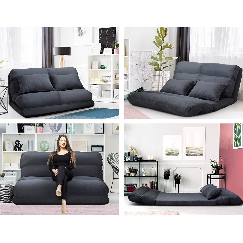 Dark charcoal suede floor lounger shown in four room settings upright, reclined and flat with people