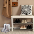 Grey-trim clear boot bag on entryway floor next to shoe bench rack with shoes coat and bag on wall hooks
