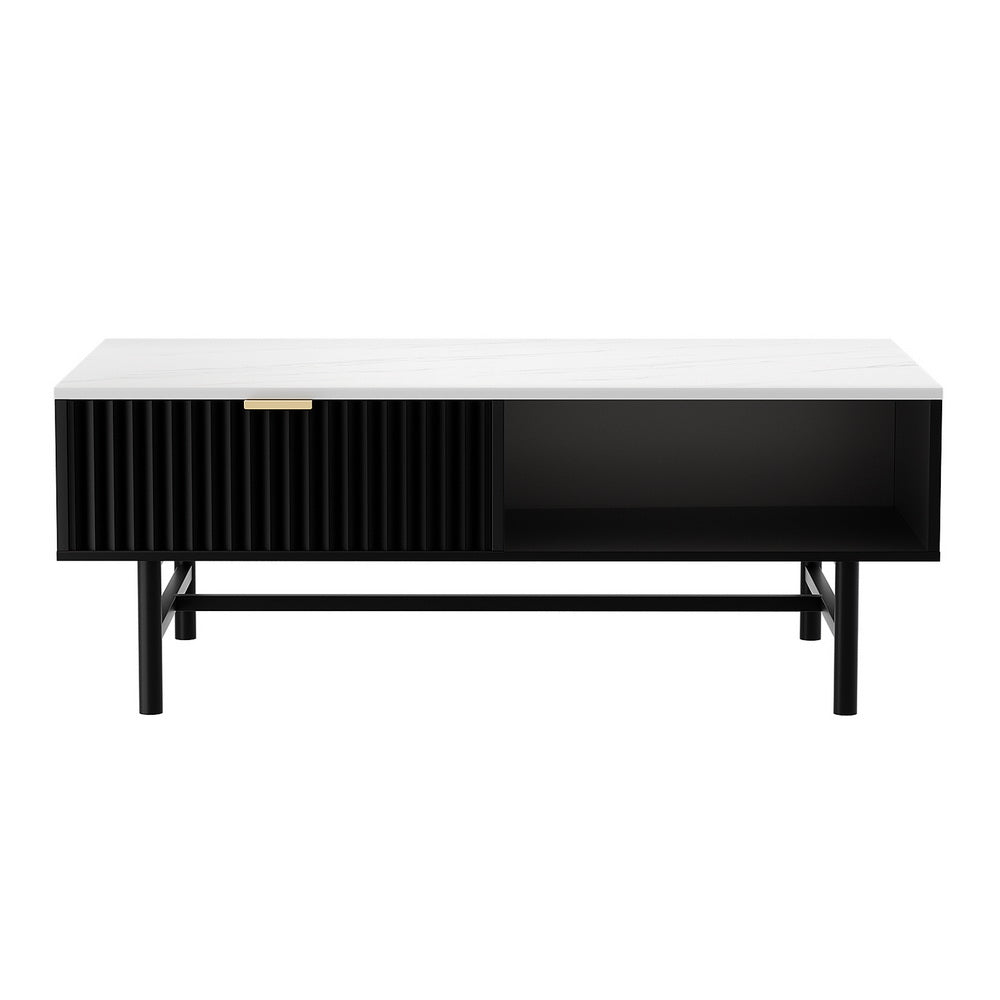 Front view of a white marble-top coffee table with black ribbed sliding drawer on the left, open shelf on the right, and