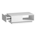 White coffee table with one drawer pulled open on the left side, open cubby on the right, flat top surface, on white