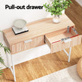Pull-out drawer detail showing interior dimensions 38.5cm wide, 24cm deep, 10cm tall, lifestyle room setting