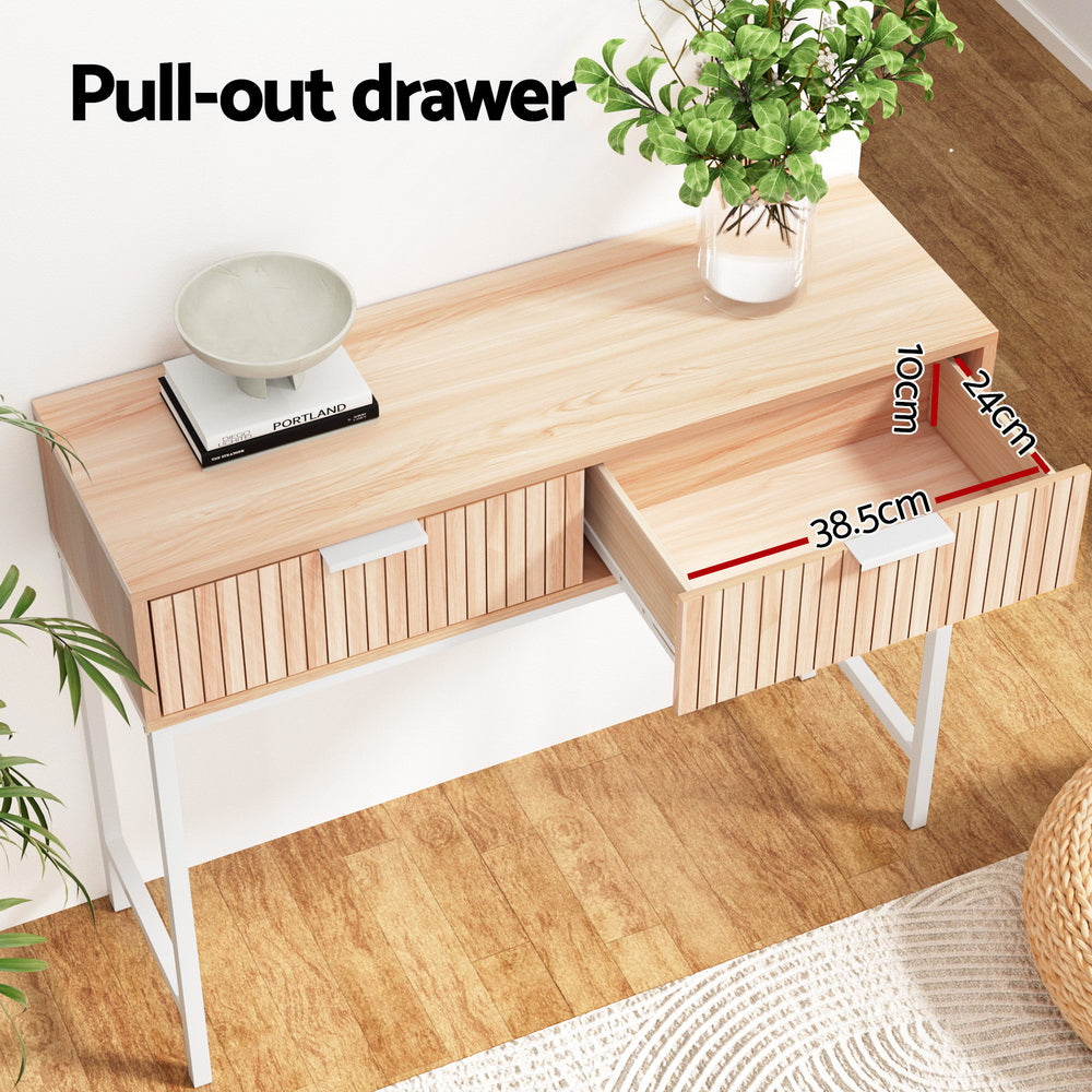 Pull-out drawer detail showing interior dimensions 38.5cm wide, 24cm deep, 10cm tall, lifestyle room setting