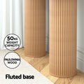 Close-up of two cylindrical fluted column bases with 50kg weight capacity and Paulownia wood badges, in room setting