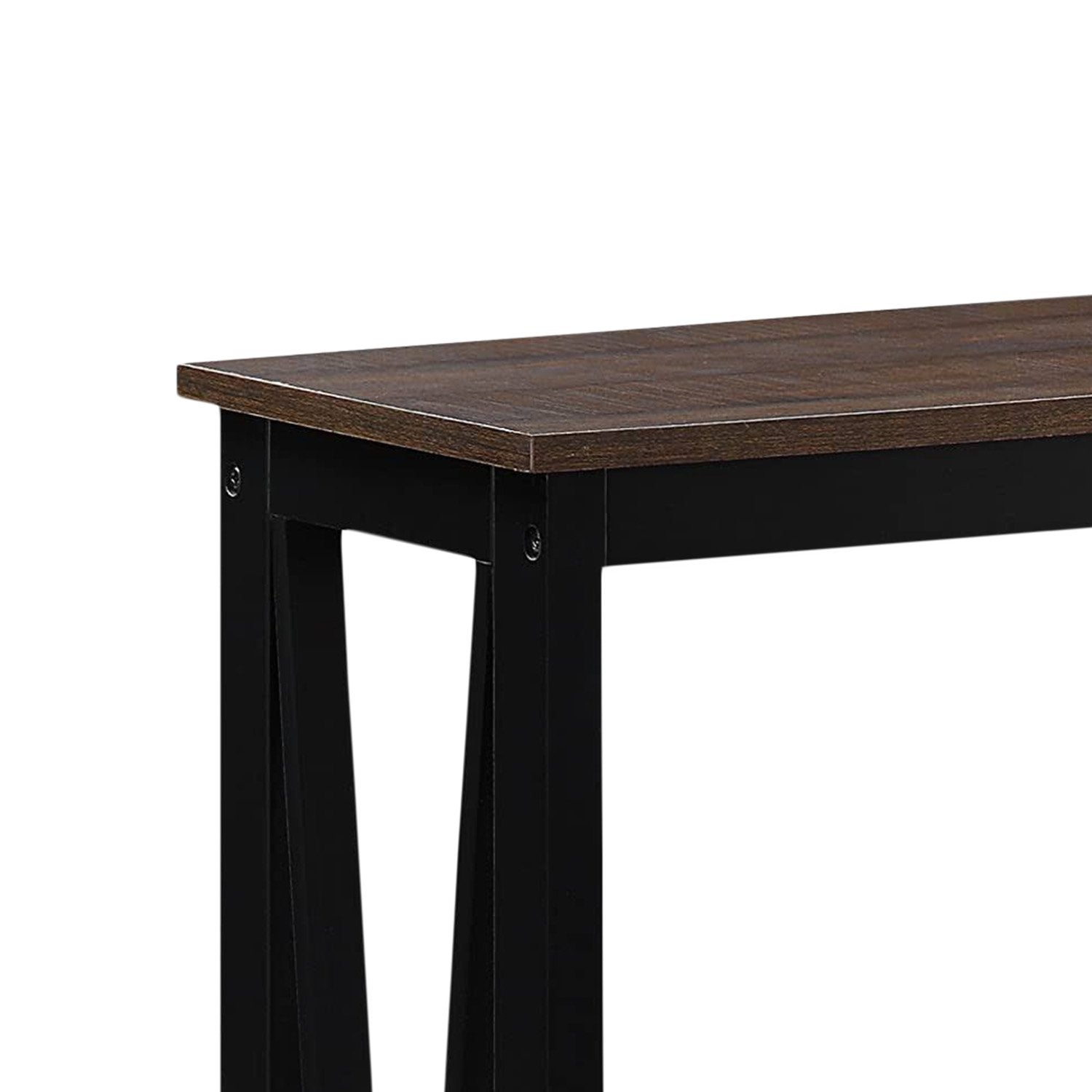 Close-up of dark walnut-effect tabletop corner showing wood grain texture and black frame junction with screws