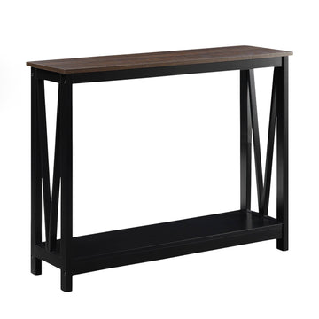 Console table with dark walnut-effect top, black X-cross frame and lower shelf, angle view on white background