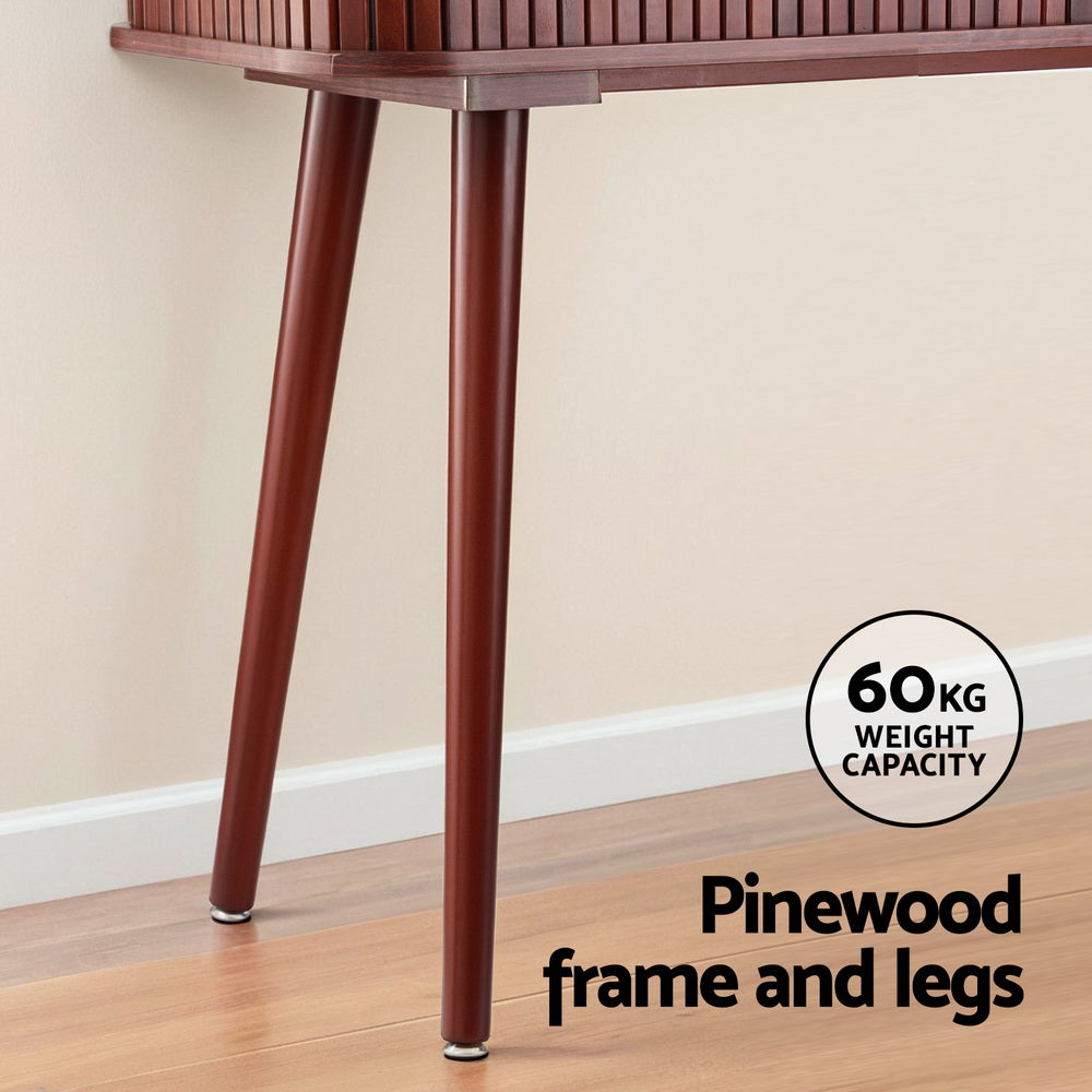 Close-up of walnut tapered pinewood legs with 60kg weight capacity badge and chrome feet