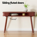 Sliding fluted doors feature panel showing open interior shelf with books; pinewood label and white vase on top