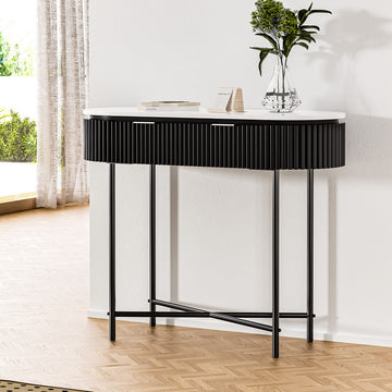 Console table with white oval top, black fluted drawer panel and black metal X-frame legs, in room near window