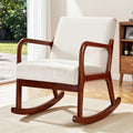 Beige corduroy rocking chair with walnut wood frame and curved rockers in living room on parquet floor