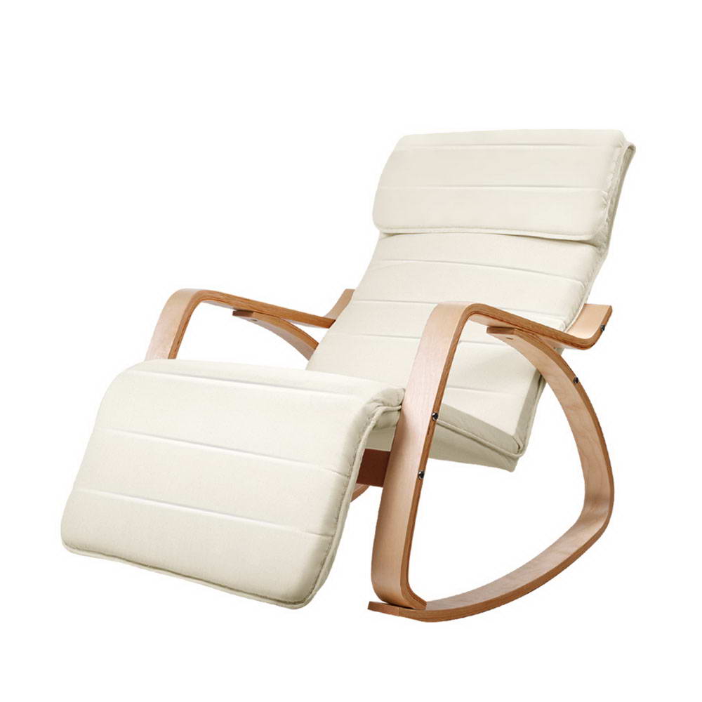 Cream ribbed fabric bentwood rocking recliner with extended footrest and curved wood arms, angle view on white background