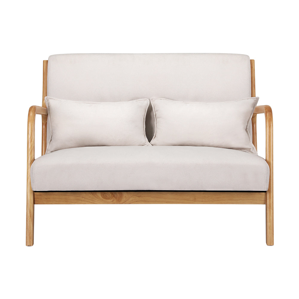 Cream fabric two-seater loveseat with natural wood curved frame, two cushions, front view on white background