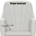 Cream fabric rocking chair close-up showing fan-stripe backrest pattern and removable cushion callout