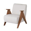 Cream fabric accent chair with walnut V-shaped oak legs and rounded armrests, three-quarter angle on white background