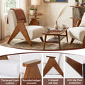 Cream fabric V-leg accent chair lifestyle, insets: foam cushion, rounded armrests, V-shaped oak legs, floor protectors