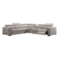 Cream leather L-shaped sectional recliner sofa front view with extended footrests and centre console on white background