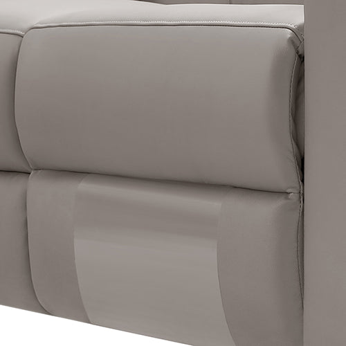 Close-up of cream leather recliner sofa padded backrest cushion with stitching and two-tone upholstery detail