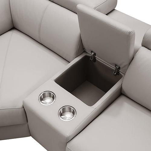 Close-up of cream leather recliner sofa centre console with open storage box and two steel cup holders
