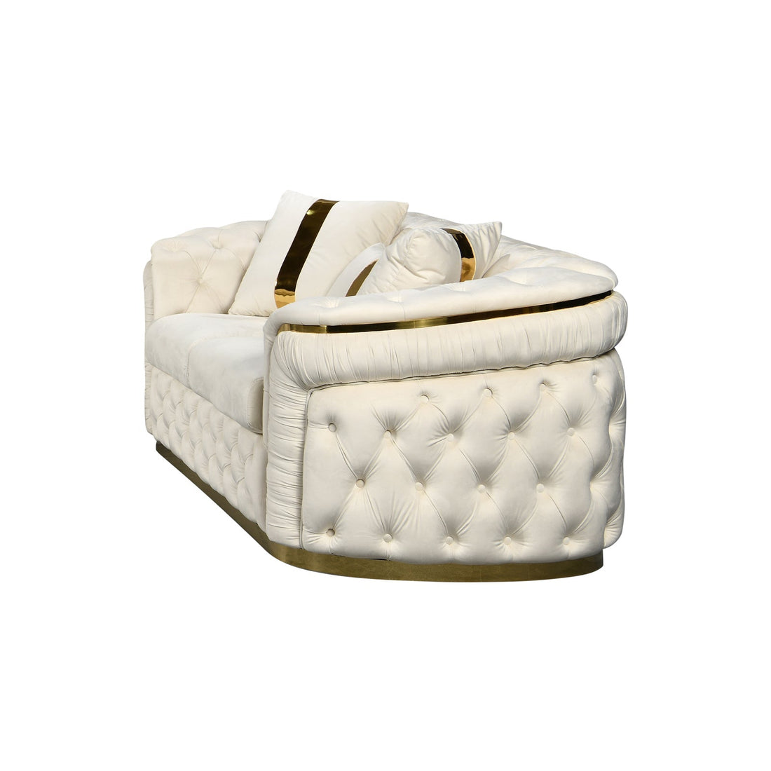 Cream velvet chesterfield 2-seater loveseat with gold-striped pillows and button tufting on white background