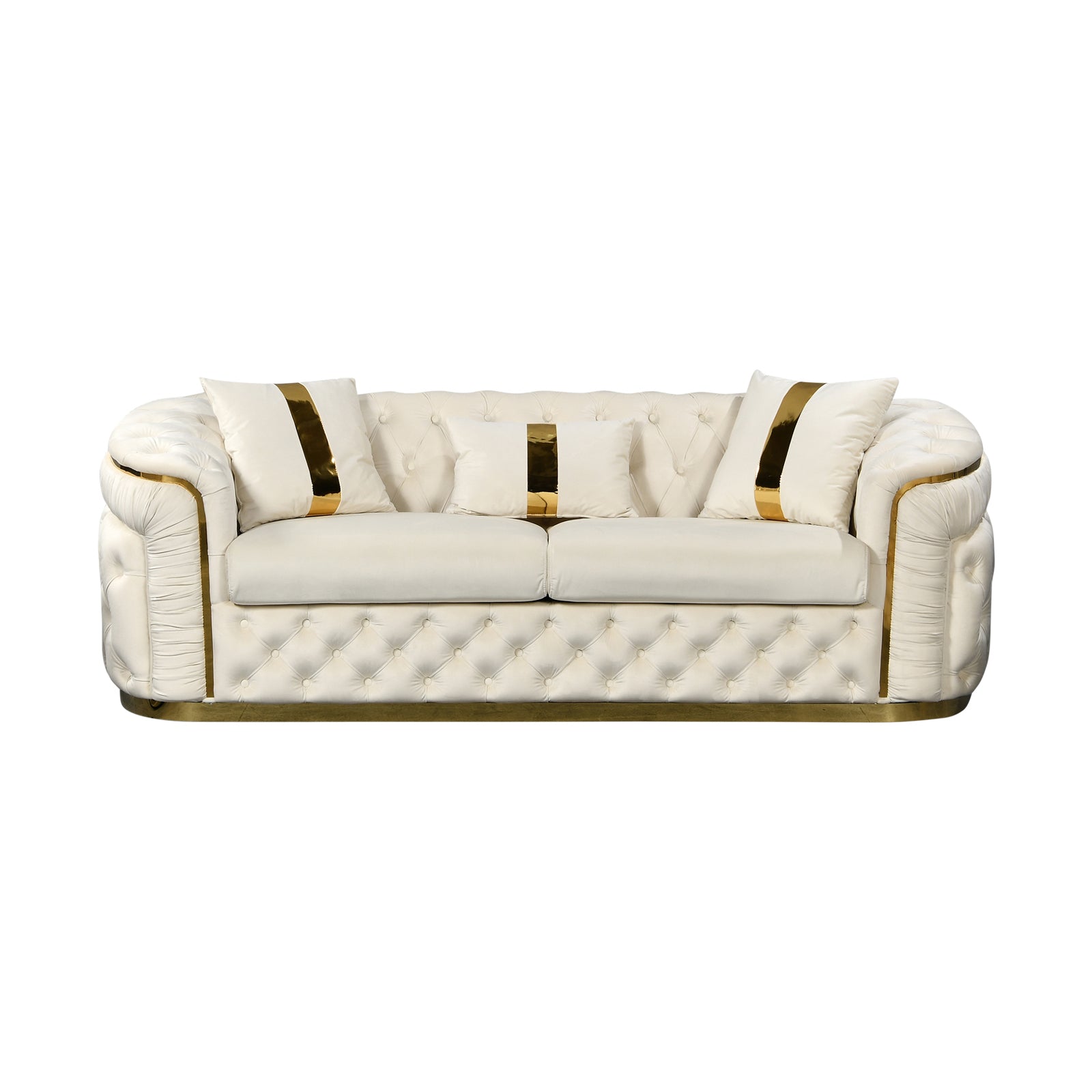 Cream velvet chesterfield 3-seater sofa with gold-striped pillows and button tufting on white background