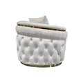 Right-side view of cream velvet chesterfield sofa showing rounded arm end and tufted exterior on white