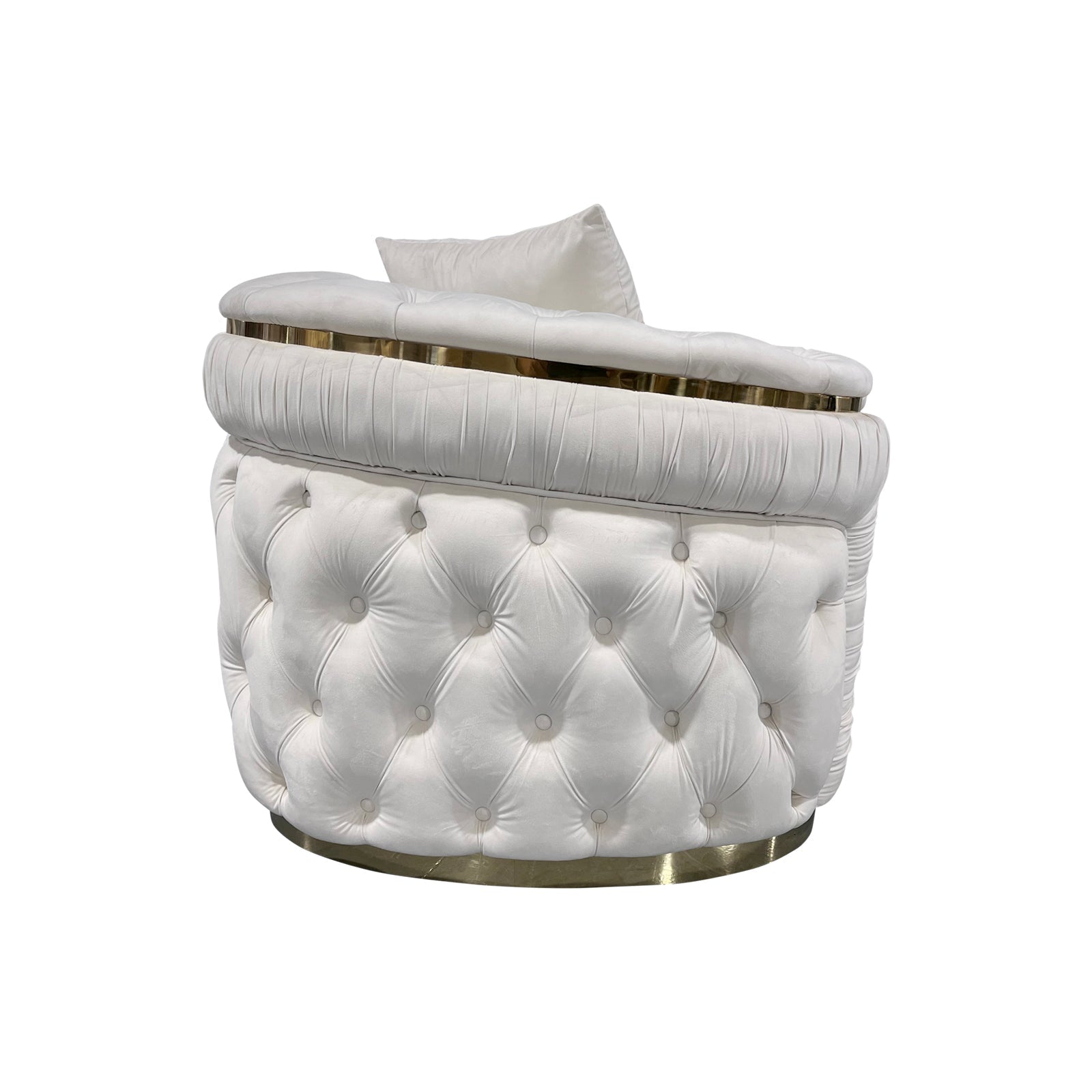 Right-side view of cream velvet chesterfield sofa showing rounded arm end and tufted exterior on white