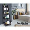Dark espresso 5-tier ladder shelf in bedroom with decor items; text reads Wall-mounted or freestanding, bedside chic