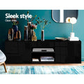 Dark espresso TV cabinet sleek style in teal room with center open shelves disc player and decorative vases