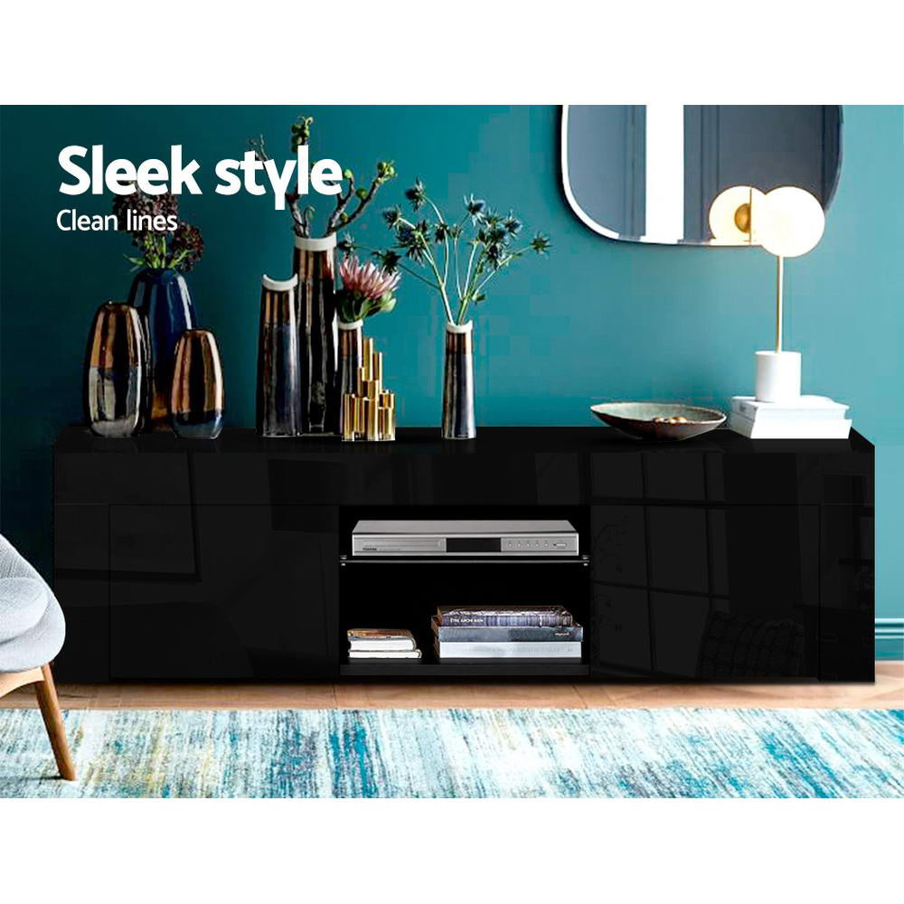 Dark espresso TV cabinet sleek style in teal room with center open shelves disc player and decorative vases