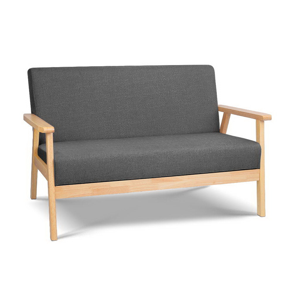 Dark grey fabric two-seater sofa with solid natural wood frame and flat armrests, angle view on white background
