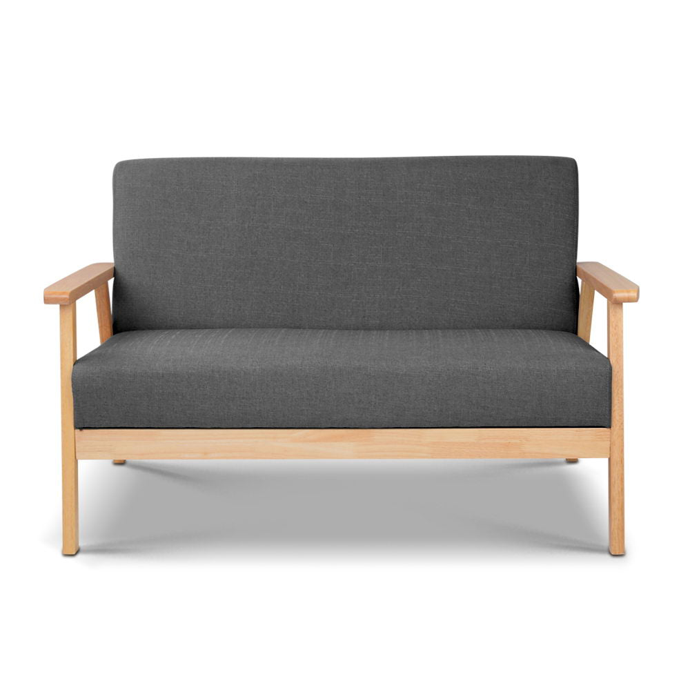 Dark grey fabric two-seater sofa with solid natural wood frame and flat armrests, front view on white background