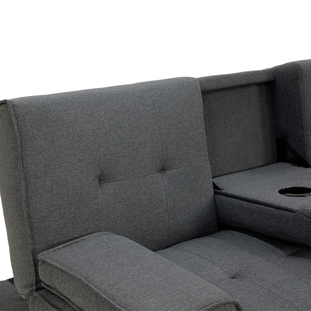 Close-up of dark grey sofa bed split backrest section with cup holder visible beside tufted seat