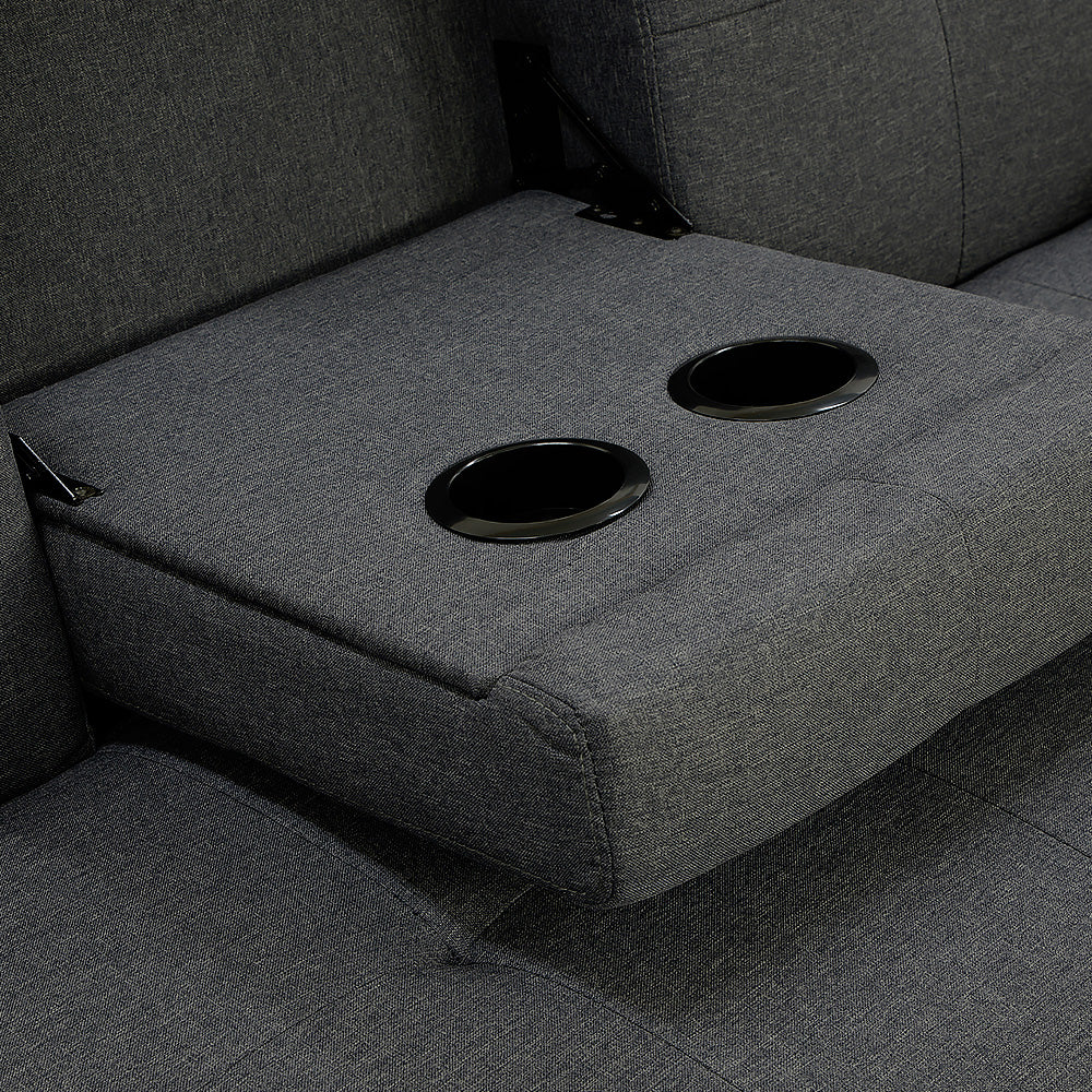 Close-up of dark grey sofa bed fold-down centre console showing two black cup holder rings