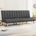 Two dark grey tufted armless sofa bed units placed side by side on white background front view