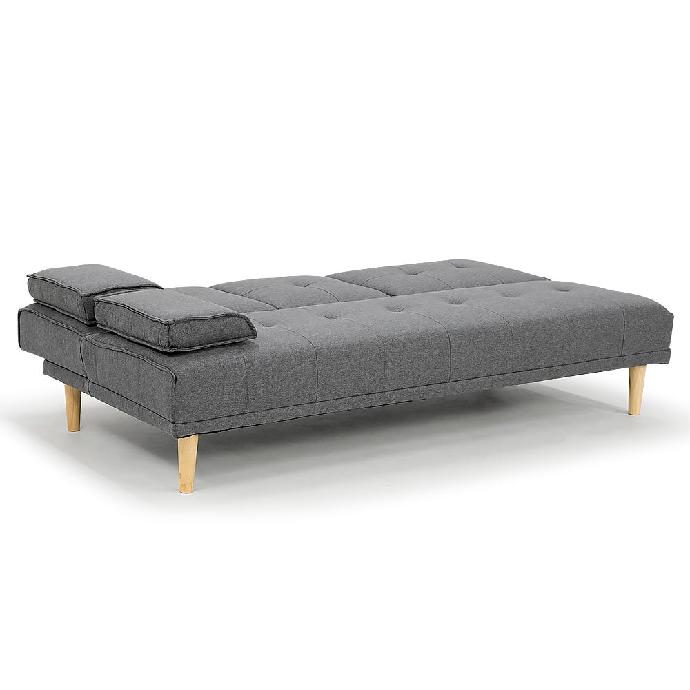 Dark grey sofa bed converted to flat position viewed from right angle on white background