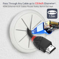 White cable grommet close-up showing 1.5 inch maximum cable diameter with HDMI and ethernet cable routed through