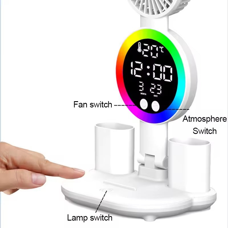 White desk organiser with fan, RGB rainbow clock display showing 12:00 and 20C, pen cups, fan and lamp switch labels