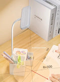 White flexible neck desk lamp with organizer base showing irradiation range diagram R=300 on wooden desk