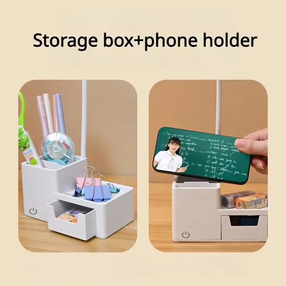 Storage box and phone holder feature showing organizer filled with stationery on left and phone placed in slot on right