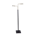 Dual-arm floor reading lamp with black square base, gold T-bar and two small circular LED disc heads on white background