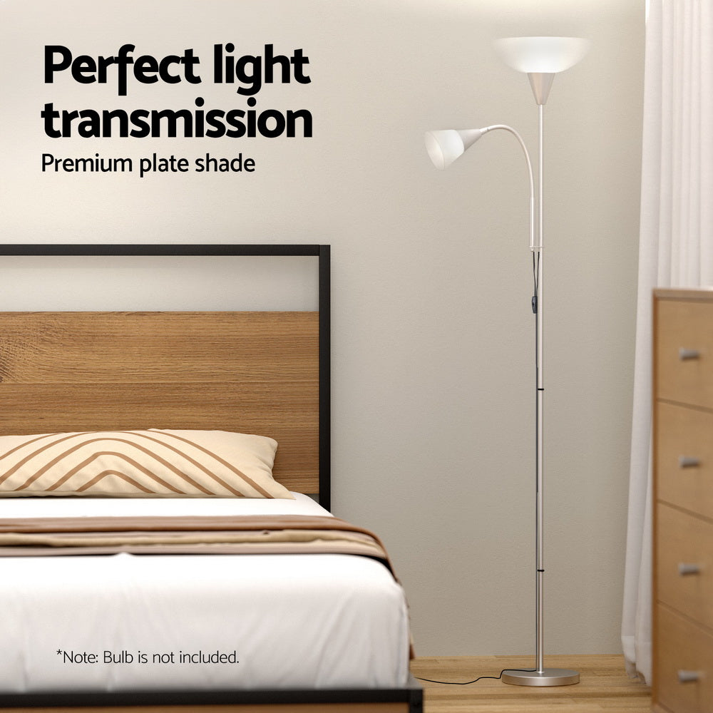 Silver dual-shade floor lamp in bedroom scene with wooden headboard and text overlay perfect light transmission