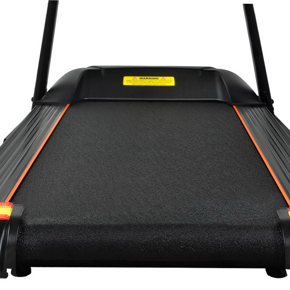Everfit 2HP treadmill running deck top-down view showing black anti-slip belt with yellow warning label