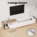 White TV unit with 3 push-to-open drawers pulled out showing 52cm by 28.5cm by 15cm interior